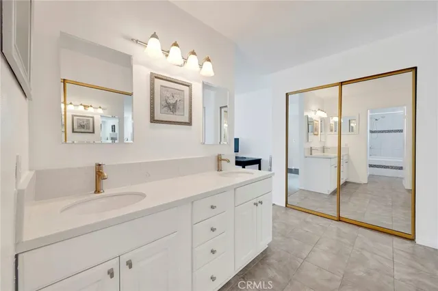 an aerial view of residential houses with outdoor space and street view