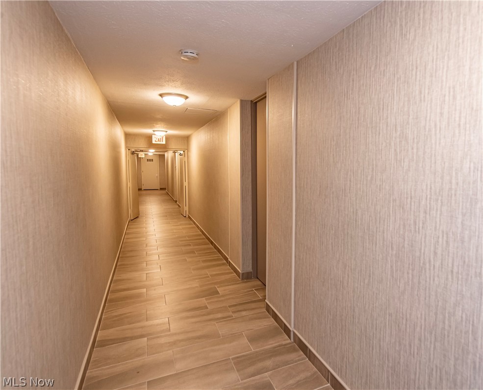 3064 Kent Road, Unit 309A Stow, OH 44224 - Photo 21 of 27 Hallway to unit - this is what it will look like when renovation is complete