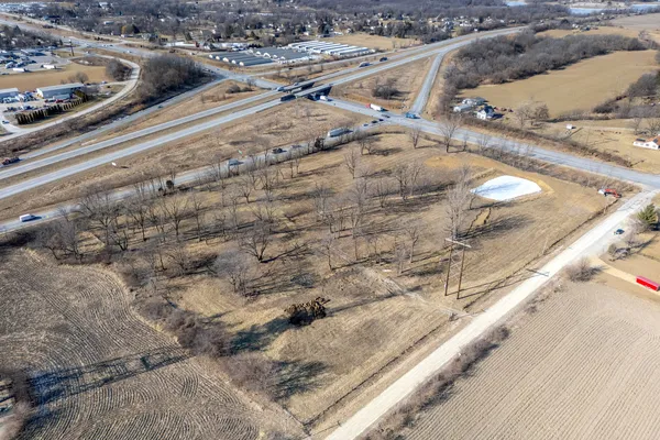 a view of a yard with trees