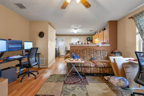 a bed room with furniture and a window