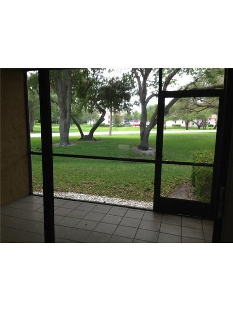 3119 Millwood Terrace, Unit 140M Boca Raton, FL 33431 - Photo 5 of 18 Exterior Back