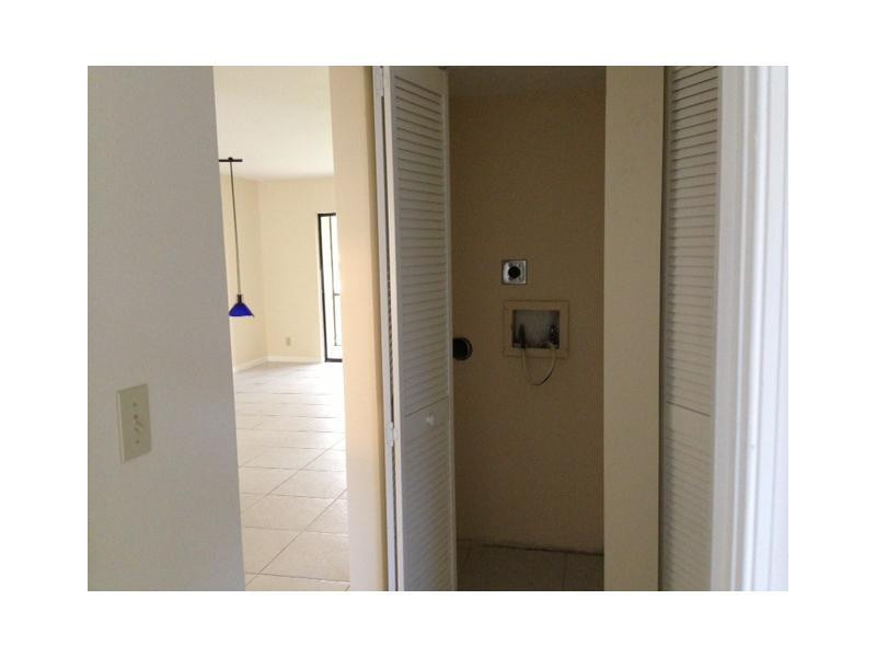 3119 Millwood Terrace, Unit 140M Boca Raton, FL 33431 - Photo 9 of 18 Laundry Room