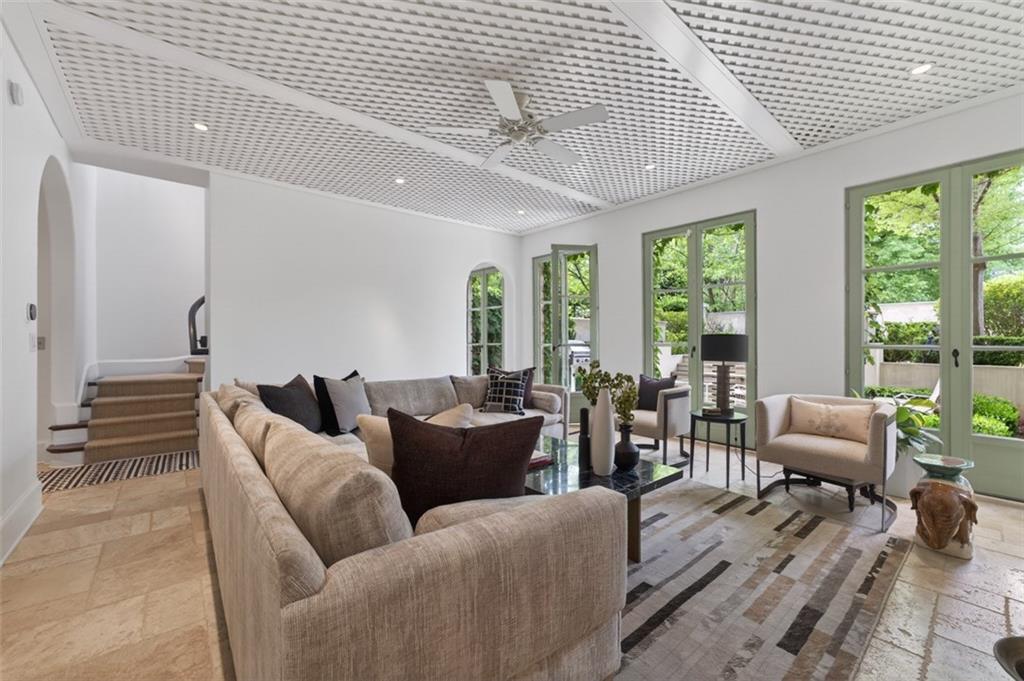 2288 Peachtree Road Northwest, Unit 4 Atlanta, GA 30309 - Photo 26 of 50 a living room with furniture and floor to ceiling windows