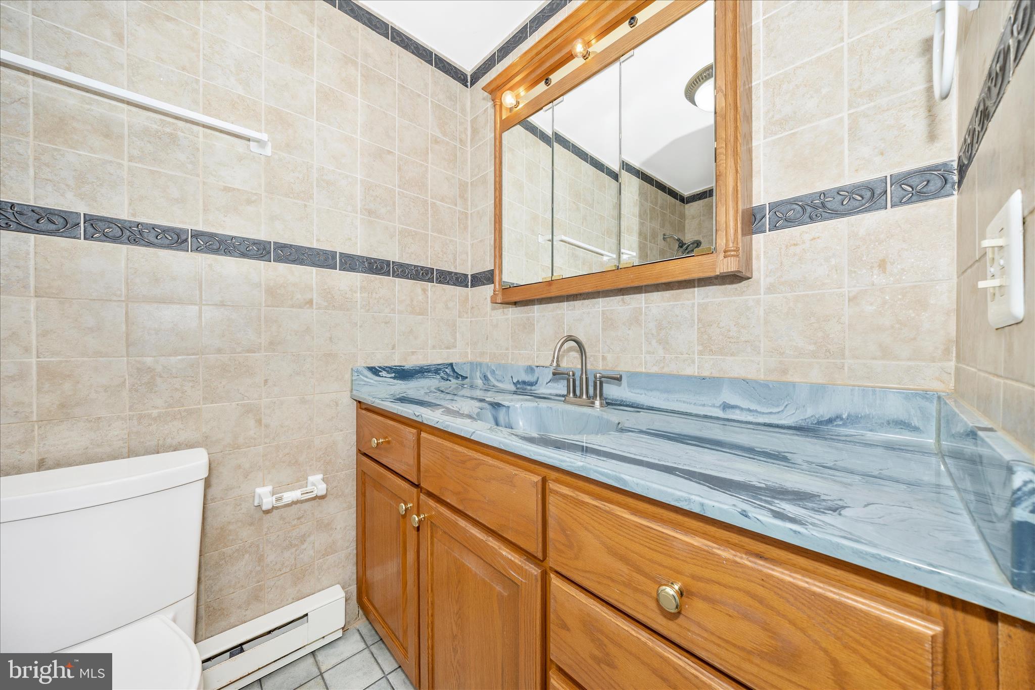 6802 Ruhland Drive Frederick, MD 21702 - Photo 27 of 52 Hall Bathroom