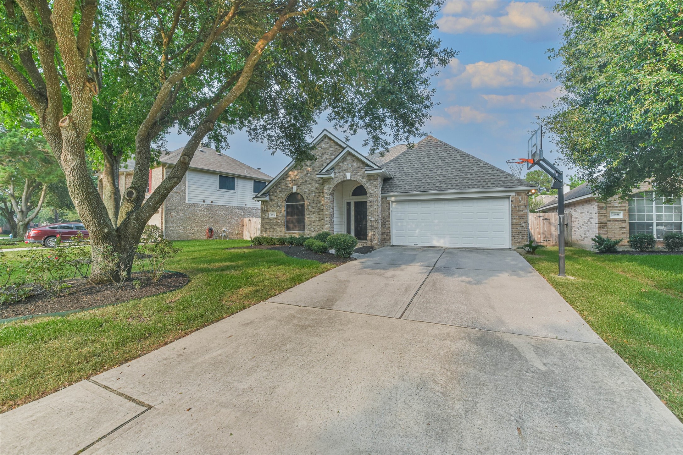 20942 Wind Field Lane Spring, TX 77379 - Photo 2 of 46 front view of a house with a yard
