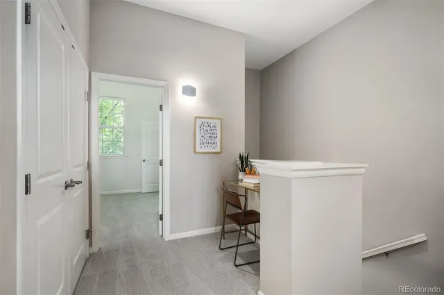 a view of room with window and bathroom