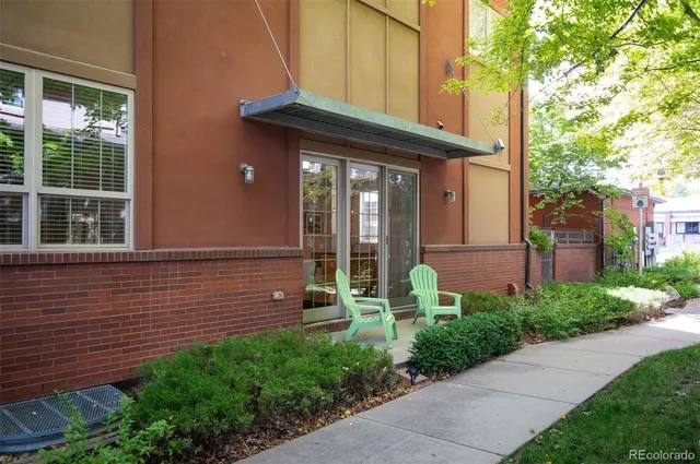 a view of a road with a house in the background