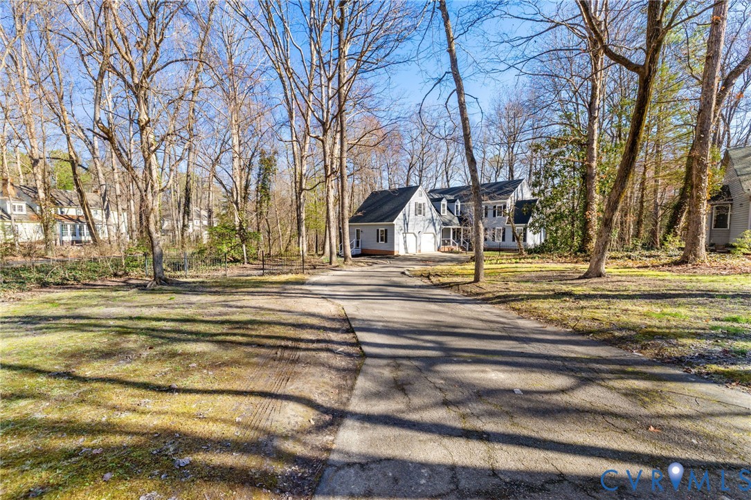 6024 Watch Harbour Road Midlothian, VA 23112 - Photo 2 of 44 a view of green space with fountain in the back