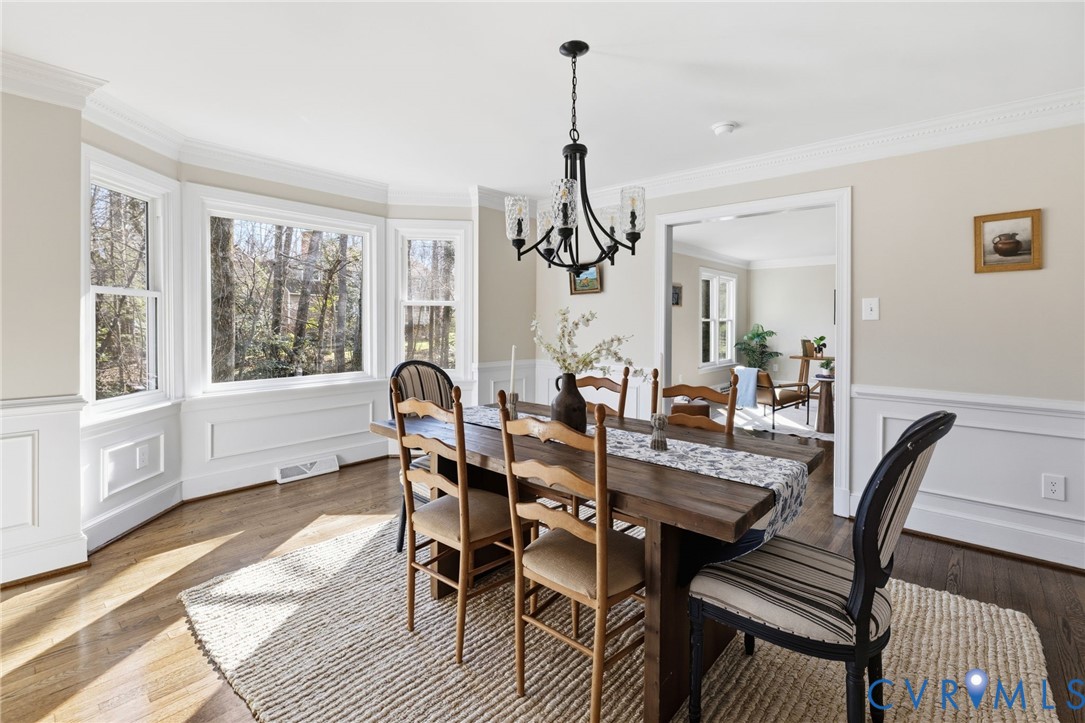 6024 Watch Harbour Road Midlothian, VA 23112 - Photo 21 of 44 a view of a dining room with furniture window and wooden floor