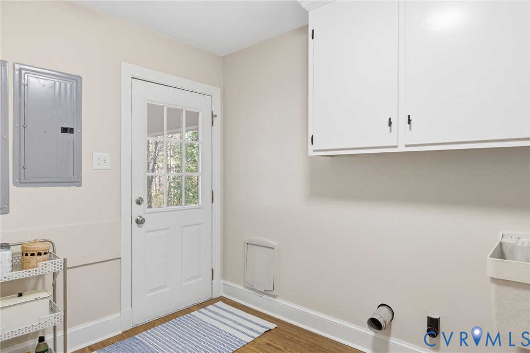 6024 Watch Harbour Road Midlothian, VA 23112 - Photo 28 of 44 a view of an empty room with wooden floor and a window
