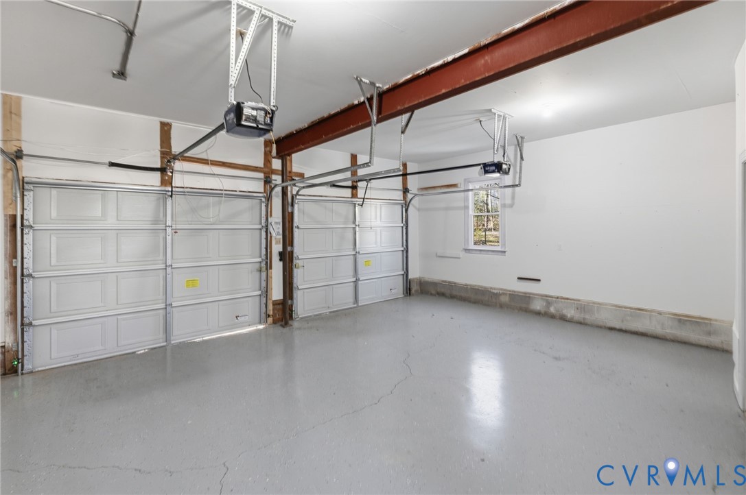 6024 Watch Harbour Road Midlothian, VA 23112 - Photo 42 of 44 a view of a room with racks on the wall