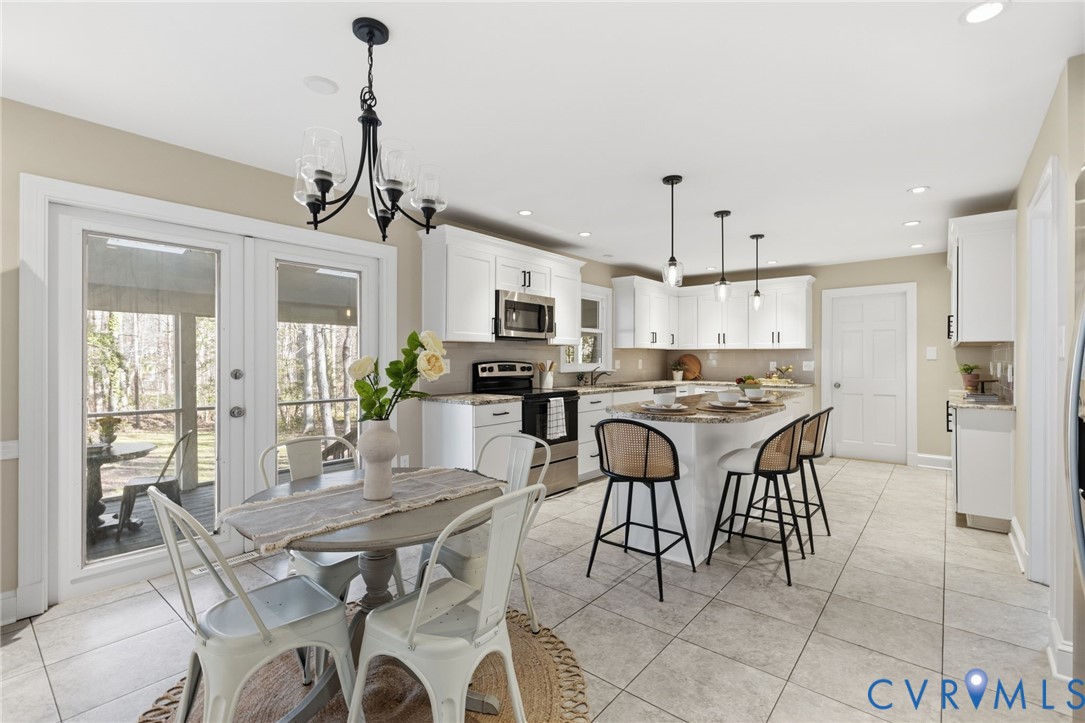 6024 Watch Harbour Road Midlothian, VA 23112 - Photo 7 of 44 a view of a dining room with furniture