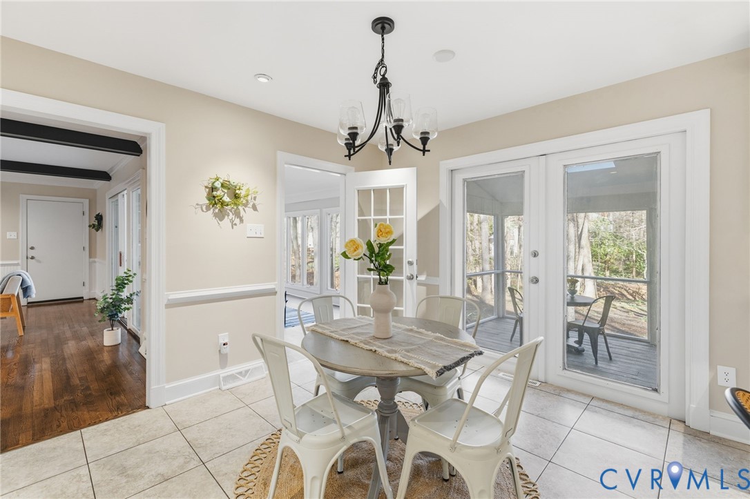 6024 Watch Harbour Road Midlothian, VA 23112 - Photo 10 of 44 a view of a dining room with furniture and wooden floor