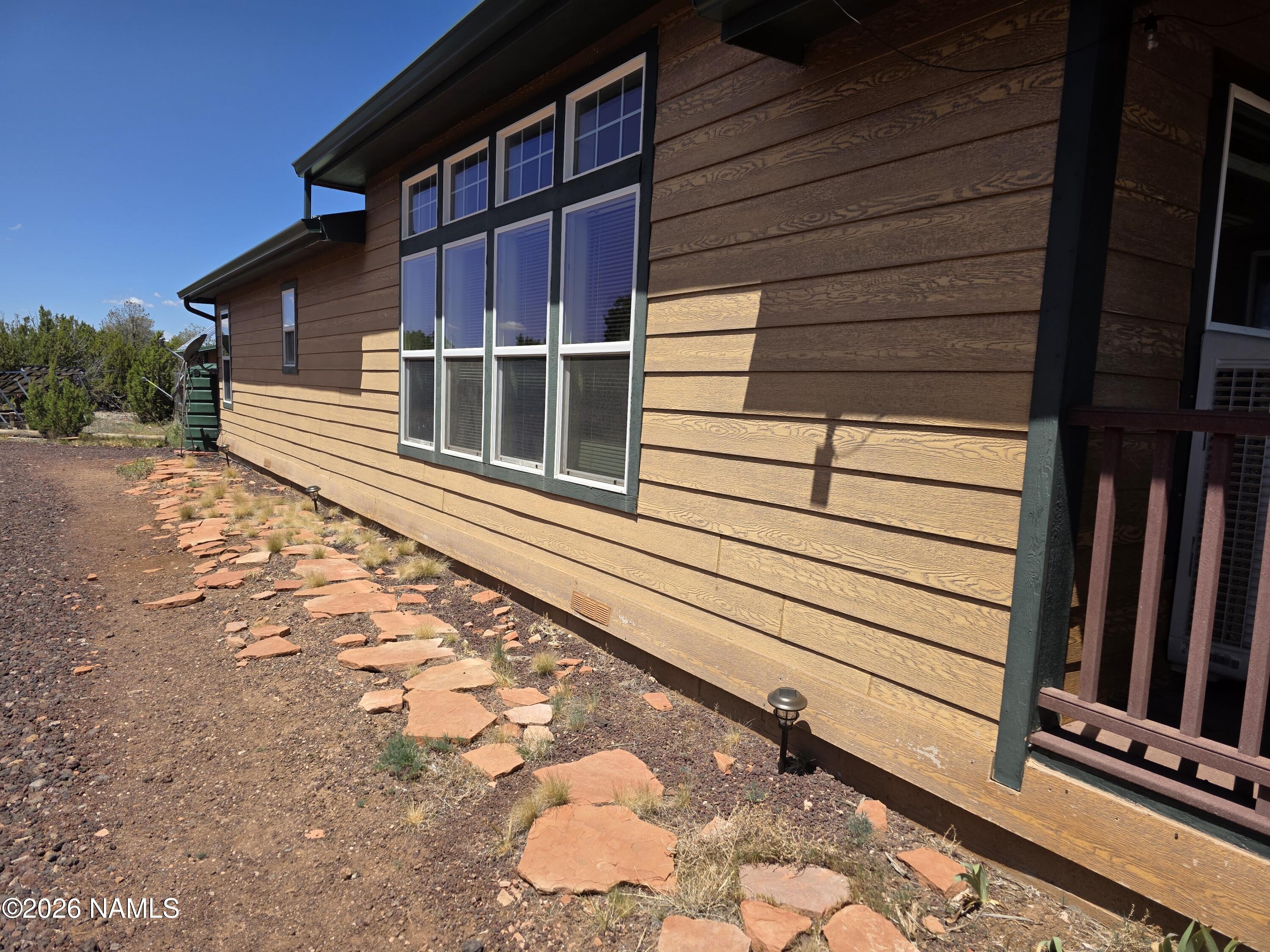 1431 East Cedar Road Williams, AZ 86046 - Photo 10 of 51 a view of a house with a backyard