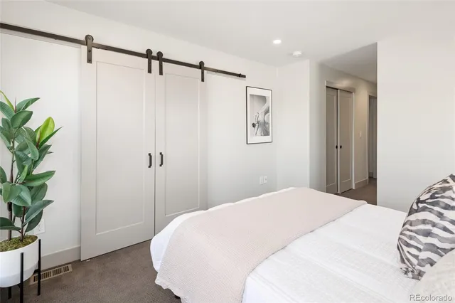 a bathroom with a sink a mirror and a shower