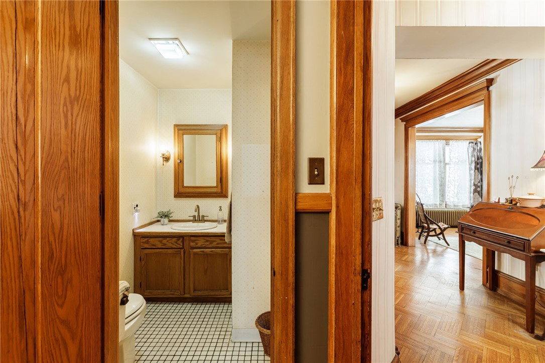 256 Seneca Parkway Rochester, NY 14613 - Photo 23 of 28 powder room and entry foyer
