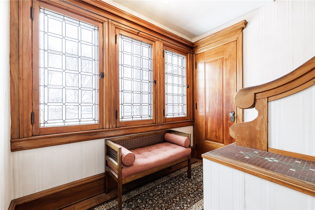 256 Seneca Parkway Rochester, NY 14613 - Photo 25 of 28 staircase landing with stained glass French window