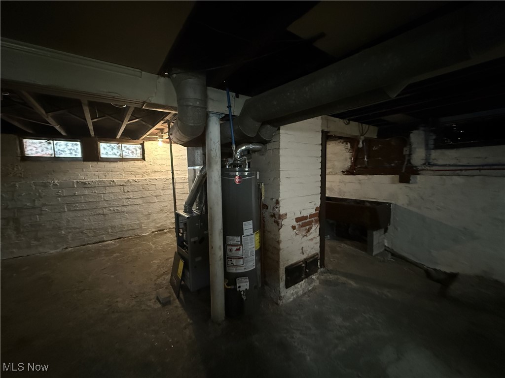 799 London Road Cleveland, OH 44110 - Photo 13 of 16 Below grade area featuring water heater