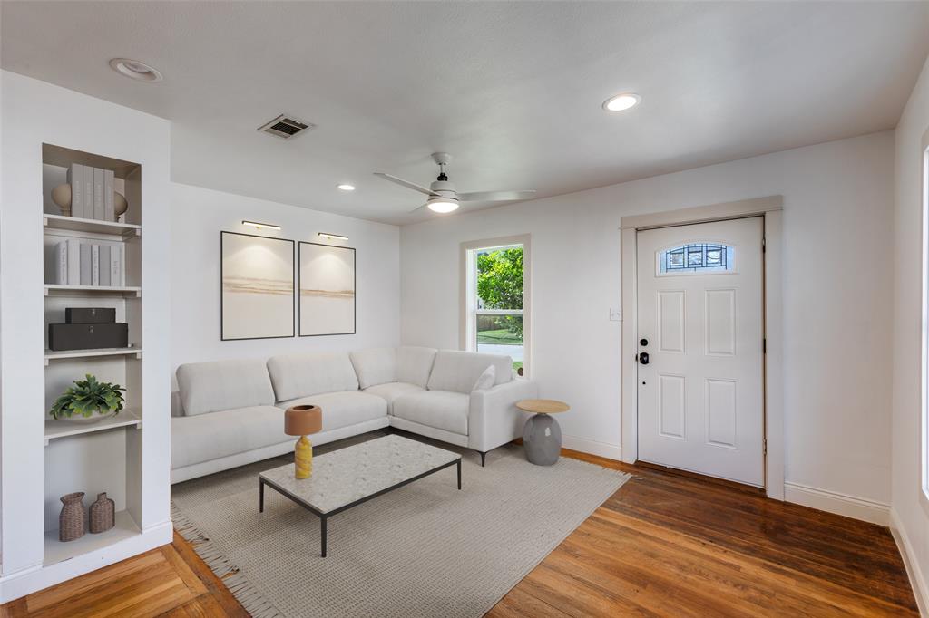 2012 Payne Avenue, Unit A Austin, TX 78757 - Photo 5 of 33 Living with built in bookcase and original wood floors