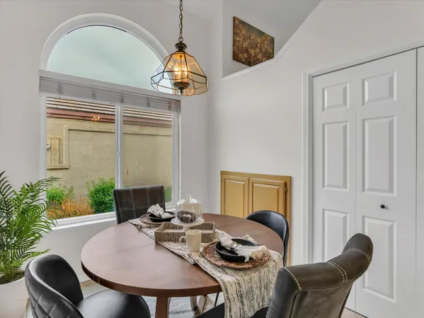 a view of a workspace with furniture