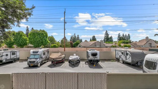 a view of a swimming pool with a yard