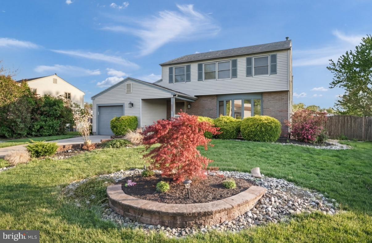24 Castor Court Sewell, NJ 08080 - Photo 1 of 19 a front view of a house with a yard