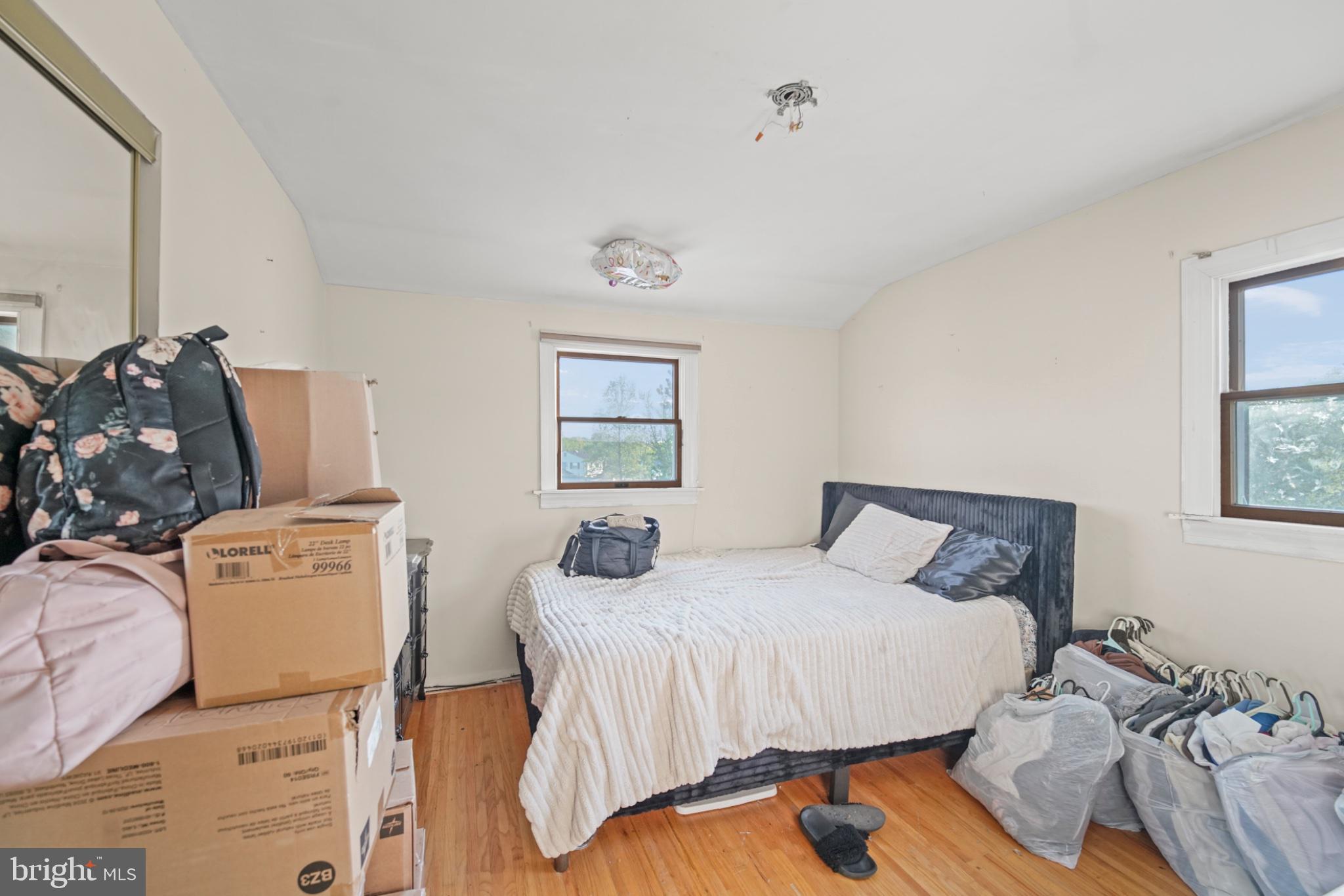 24 Castor Court Sewell, NJ 08080 - Photo 17 of 19 a bedroom with a bed and wooden floor