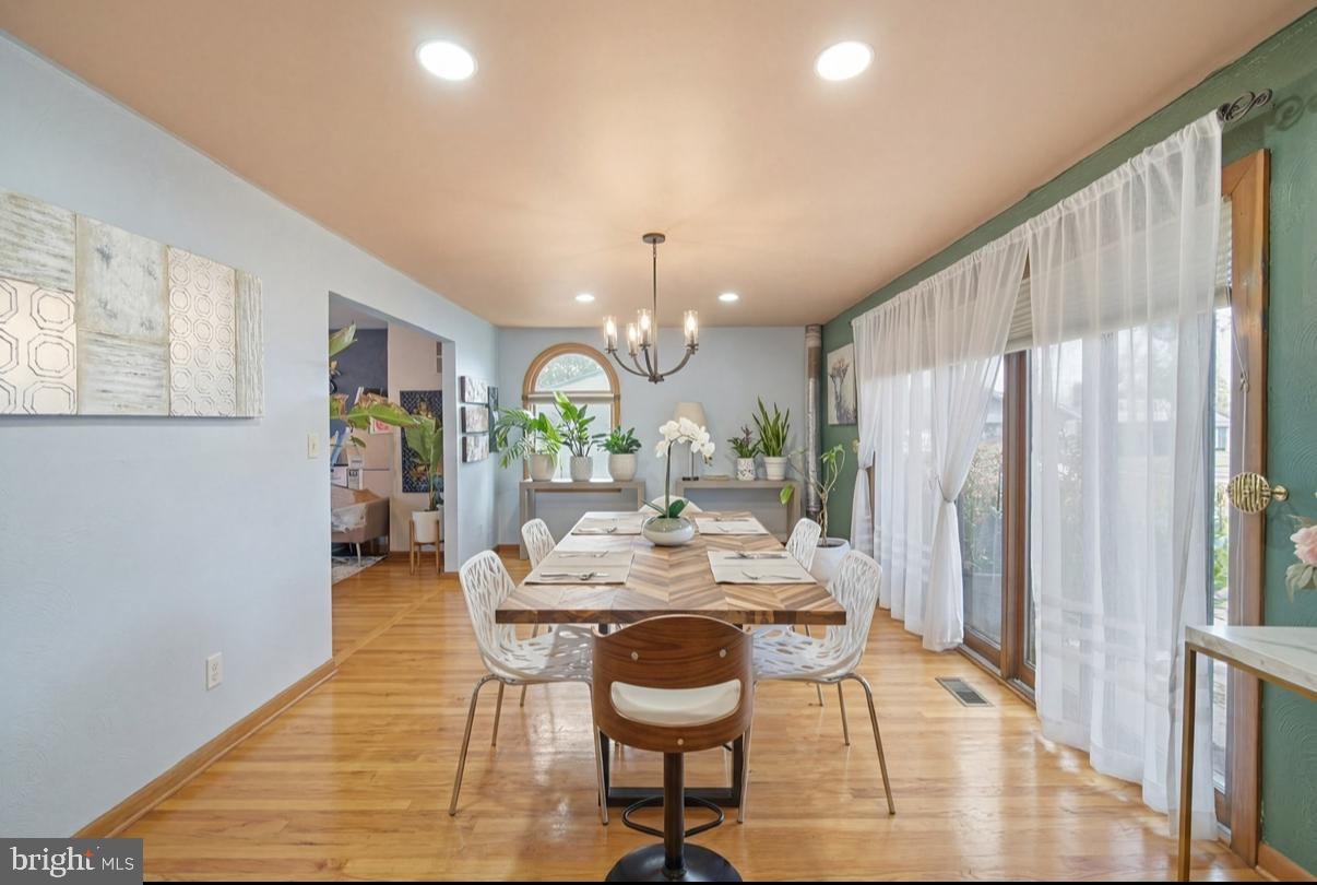 24 Castor Court Sewell, NJ 08080 - Photo 8 of 19 a dining room with furniture and wooden floor