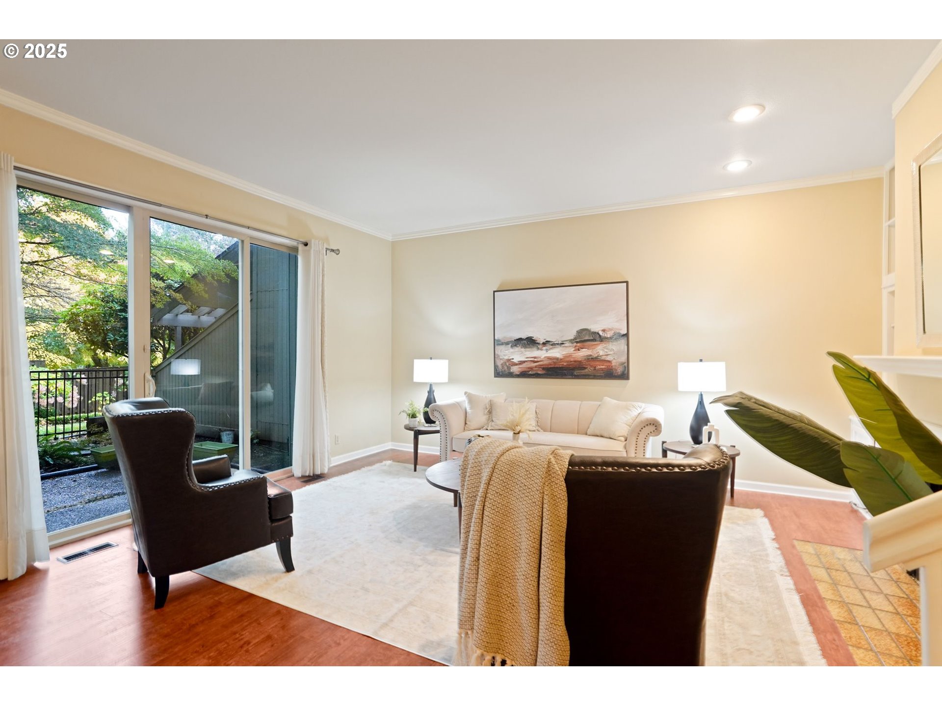 6679 Huntington Circle Southeast Salem, OR 97306 - Photo 19 of 45 a living room with furniture a large window and a dining table
