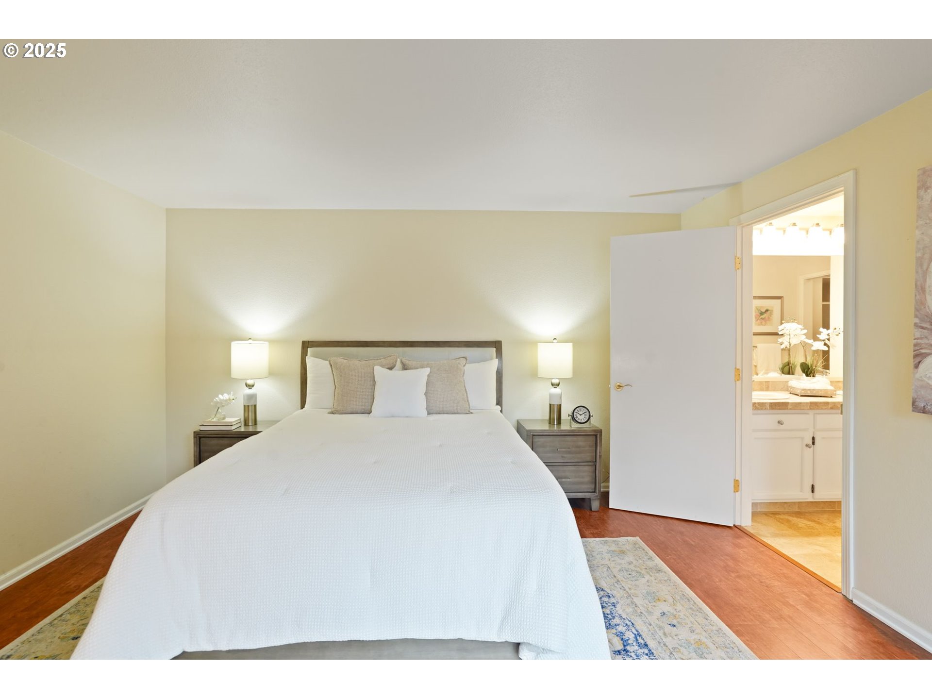 6679 Huntington Circle Southeast Salem, OR 97306 - Photo 29 of 45 a bedroom with a bed and a night stand