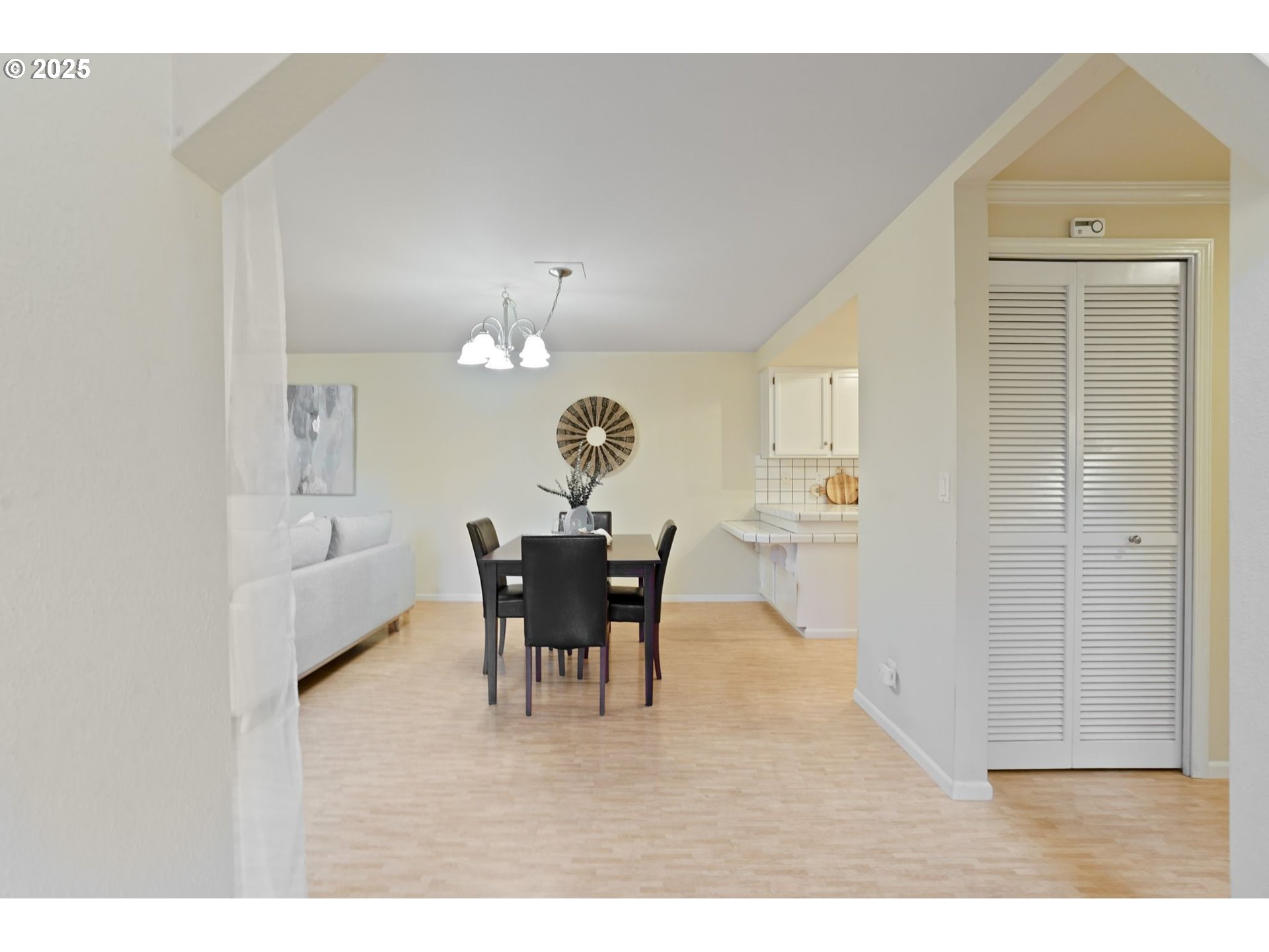 6679 Huntington Circle Southeast Salem, OR 97306 - Photo 4 of 45 a view of a dining room with furniture and wooden floor