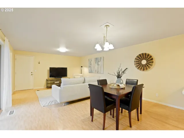a view of a dining room with furniture