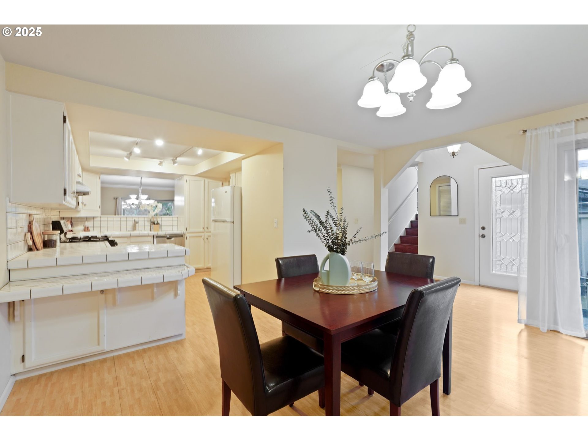 6679 Huntington Circle Southeast Salem, OR 97306 - Photo 7 of 45 a view of a dining room with furniture and wooden floor