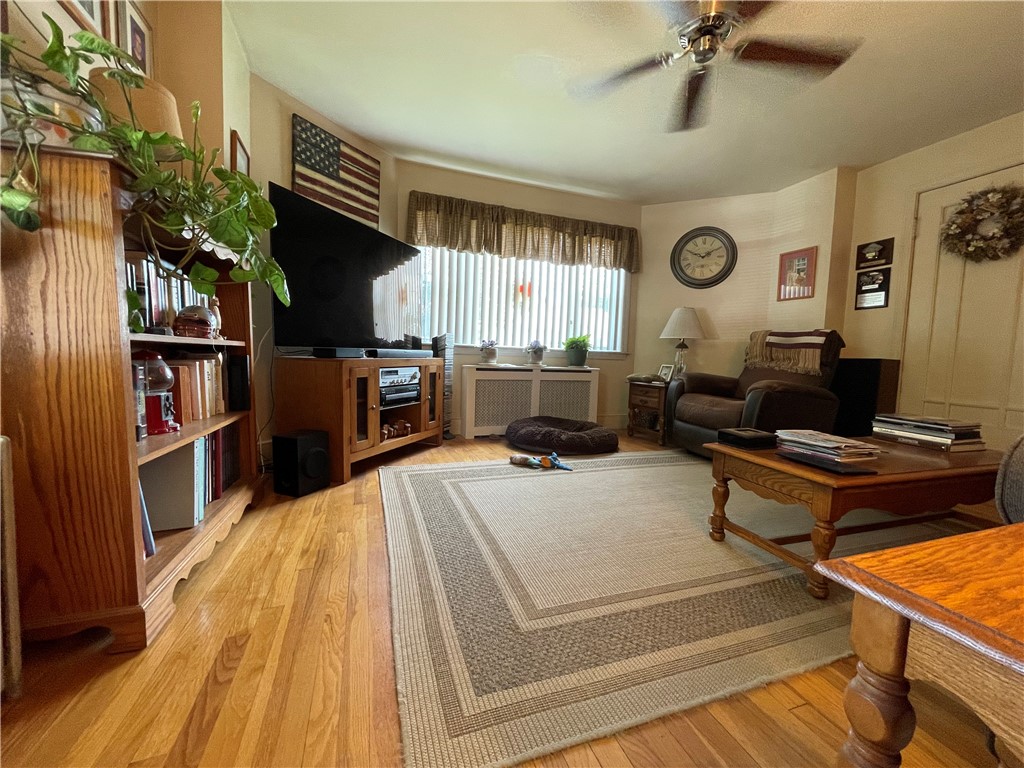348 Market Street Warren, RI 02885 - Photo 30 of 50 A warm and inviting living room with access to front screened in porch area.