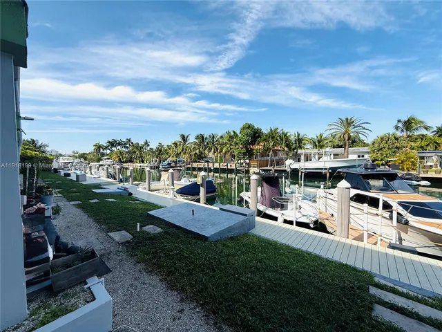 a view of a house with outdoor space and sitting area