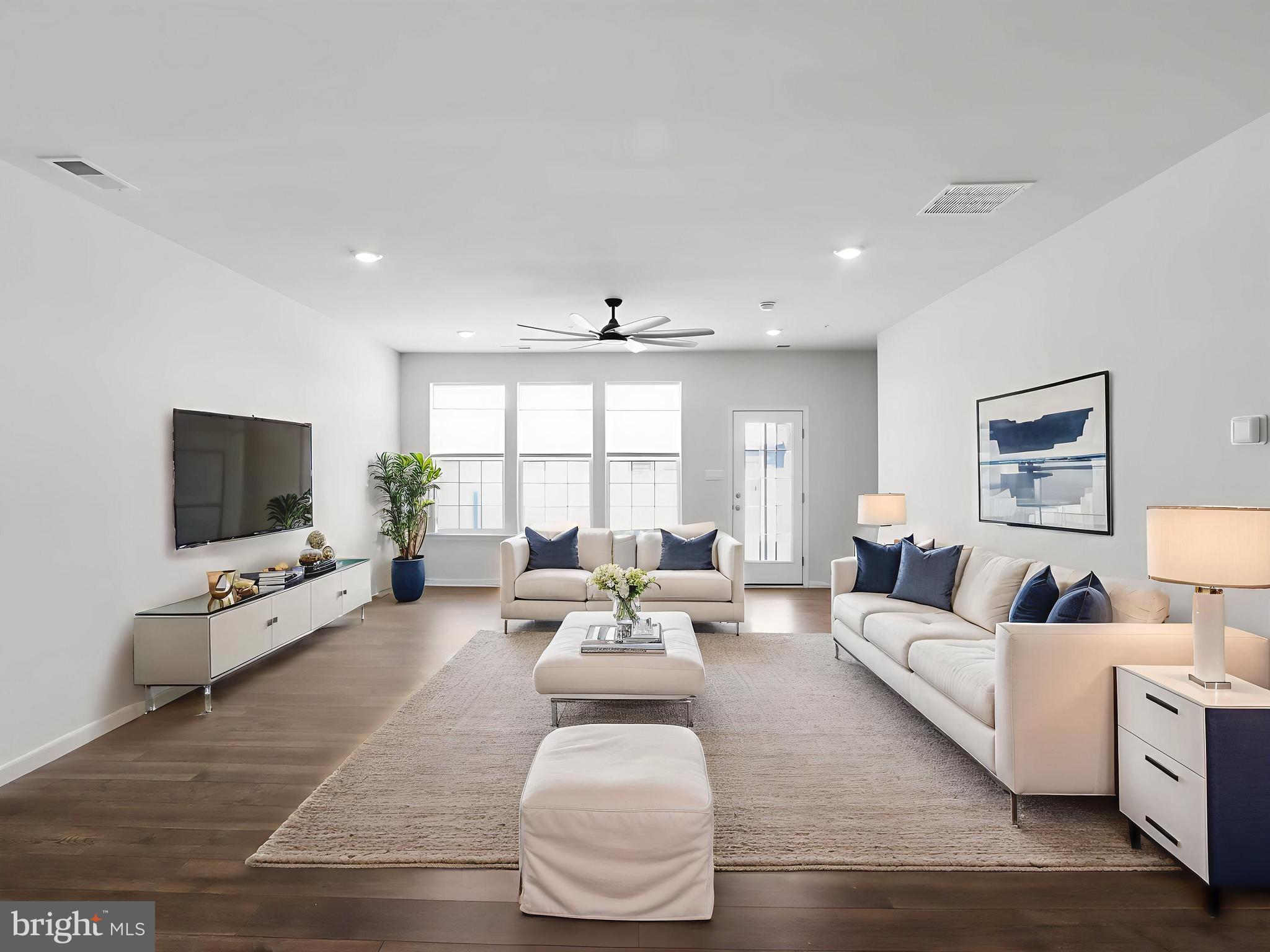 485 Hanson Street Frederick, MD 21701 - Photo 11 of 48 a living room with furniture and a flat screen tv
