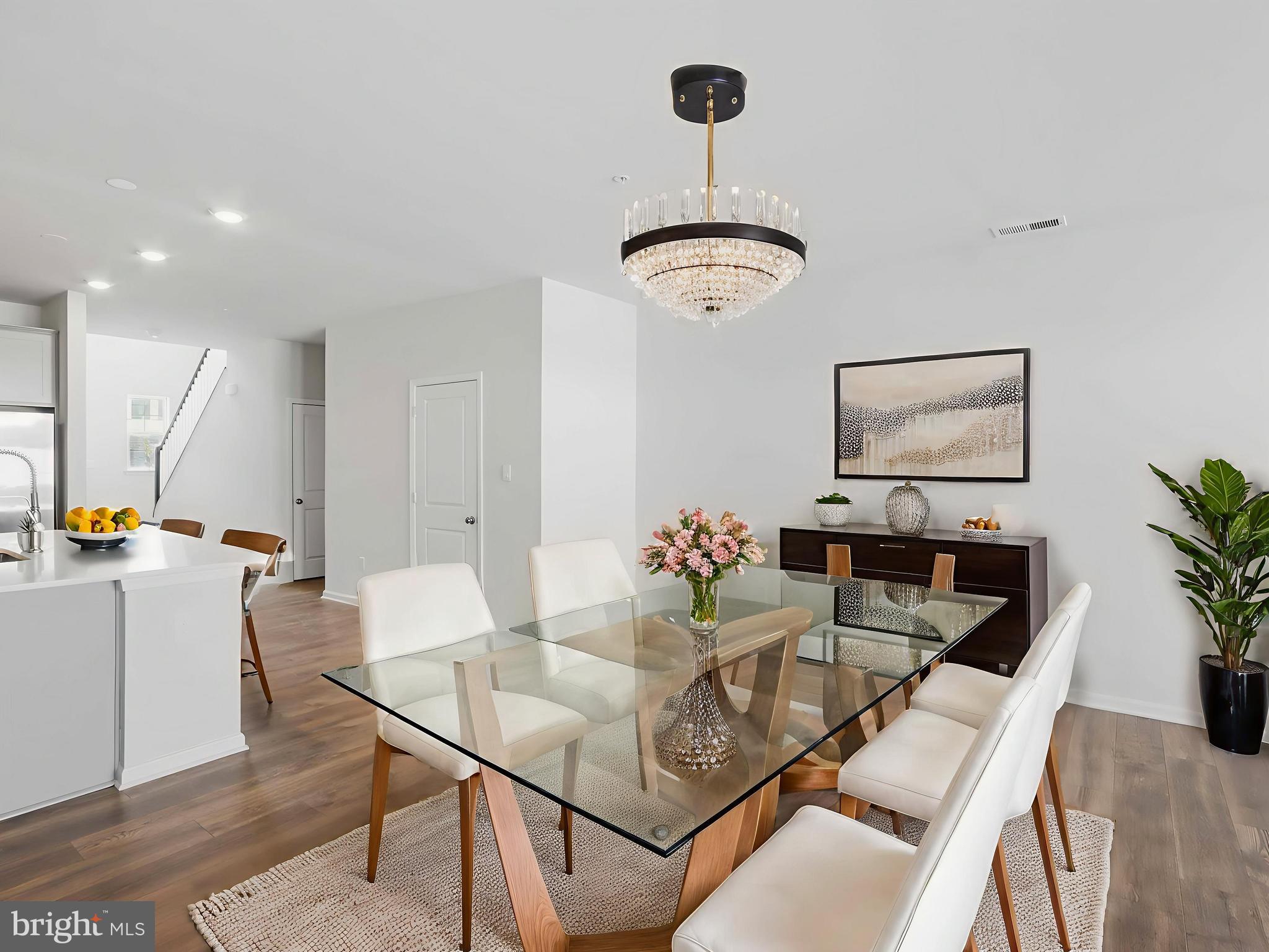 485 Hanson Street Frederick, MD 21701 - Photo 12 of 48 a living room with furniture and a chandelier