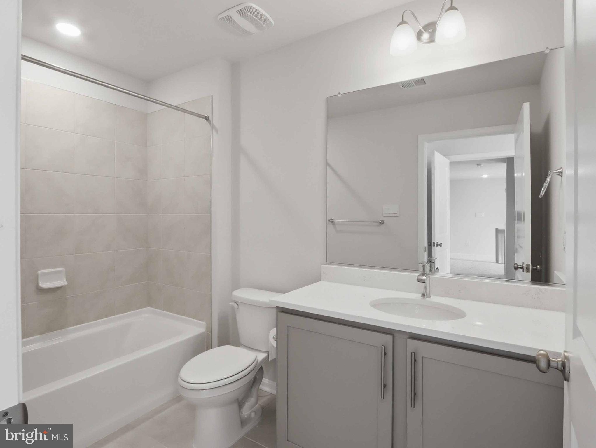 485 Hanson Street Frederick, MD 21701 - Photo 28 of 48 a bathroom with a sink toilet and shower