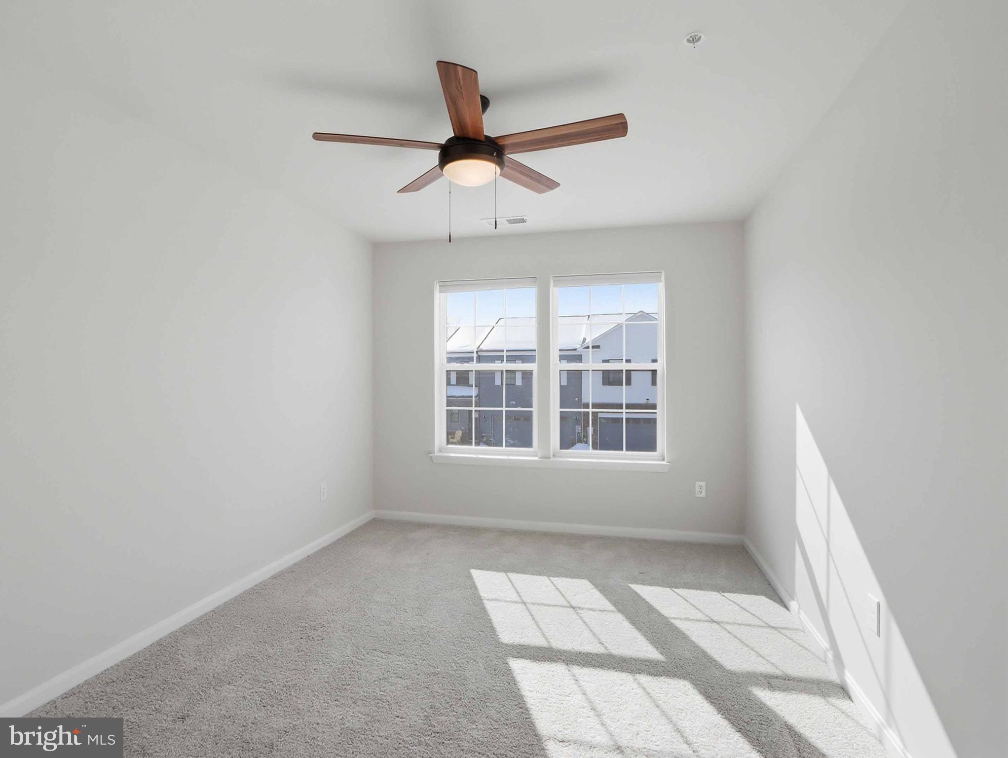 485 Hanson Street Frederick, MD 21701 - Photo 29 of 48 a view of an empty room with a window