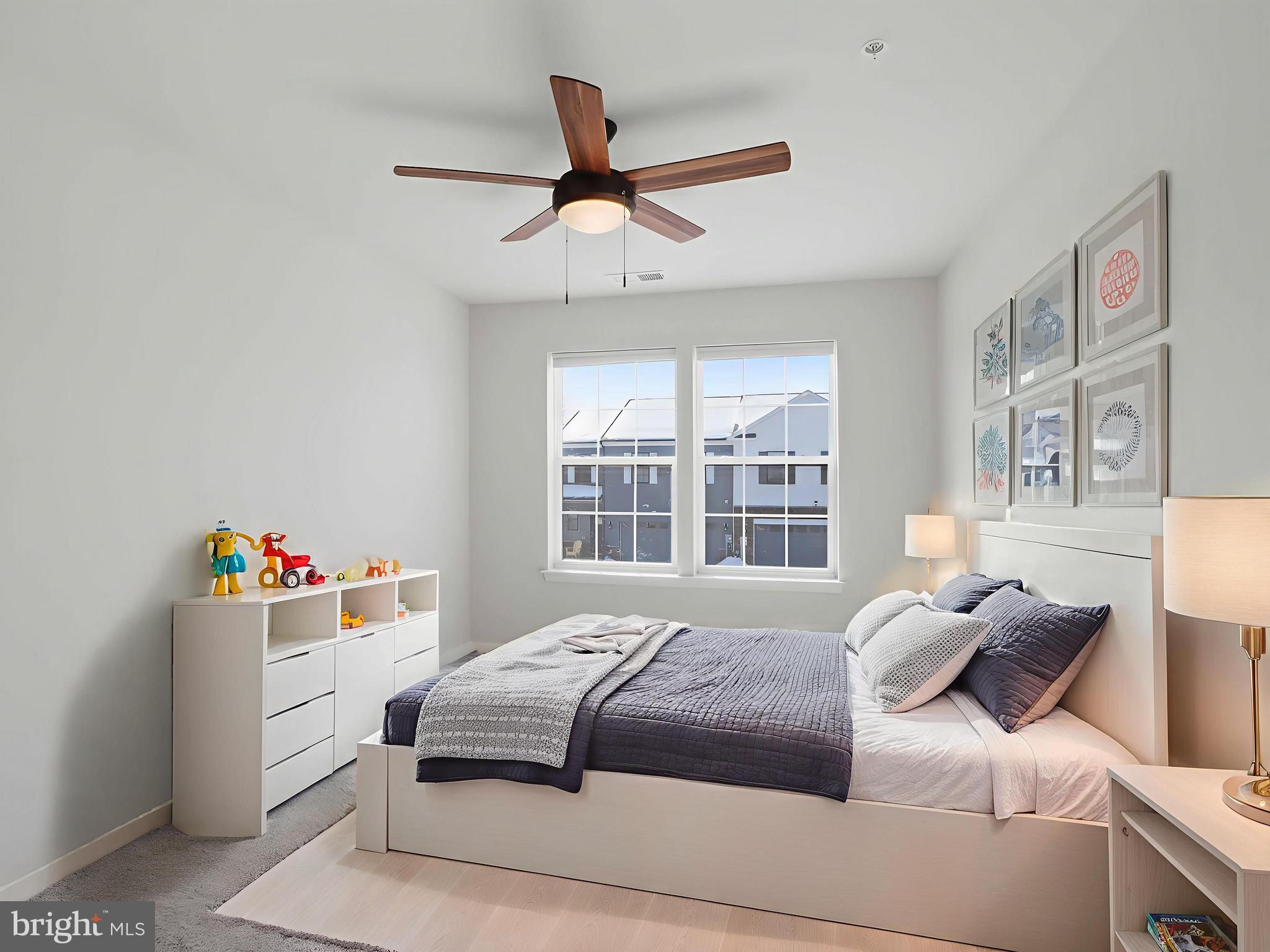 485 Hanson Street Frederick, MD 21701 - Photo 30 of 48 a bedroom with a bed and a large window