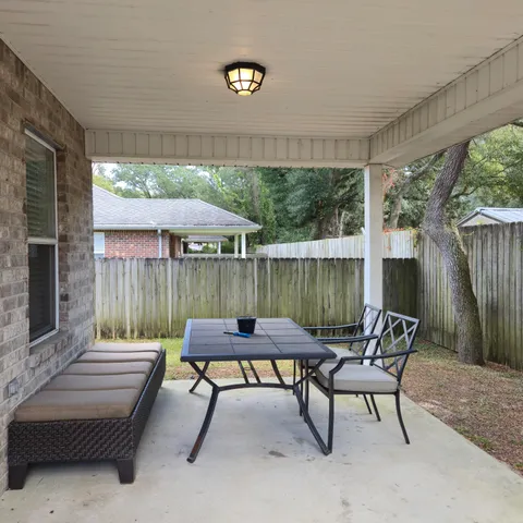 a front view of a house with patio