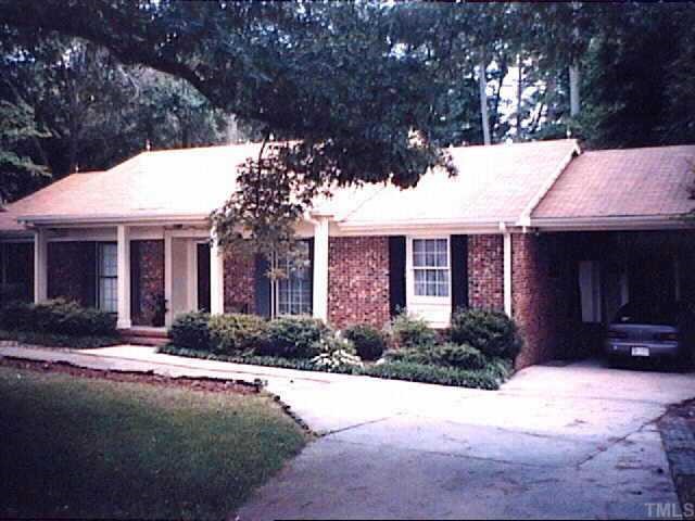 6404 Buffaloe Road Raleigh, NC 27616 - Photo 1 of 1 a front view of a house with a yard