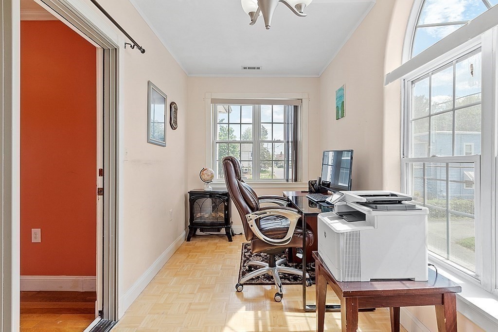 31 Booth Road Methuen, MA 01844 - Photo 17 of 38 a view of a workspace with furniture and a window
