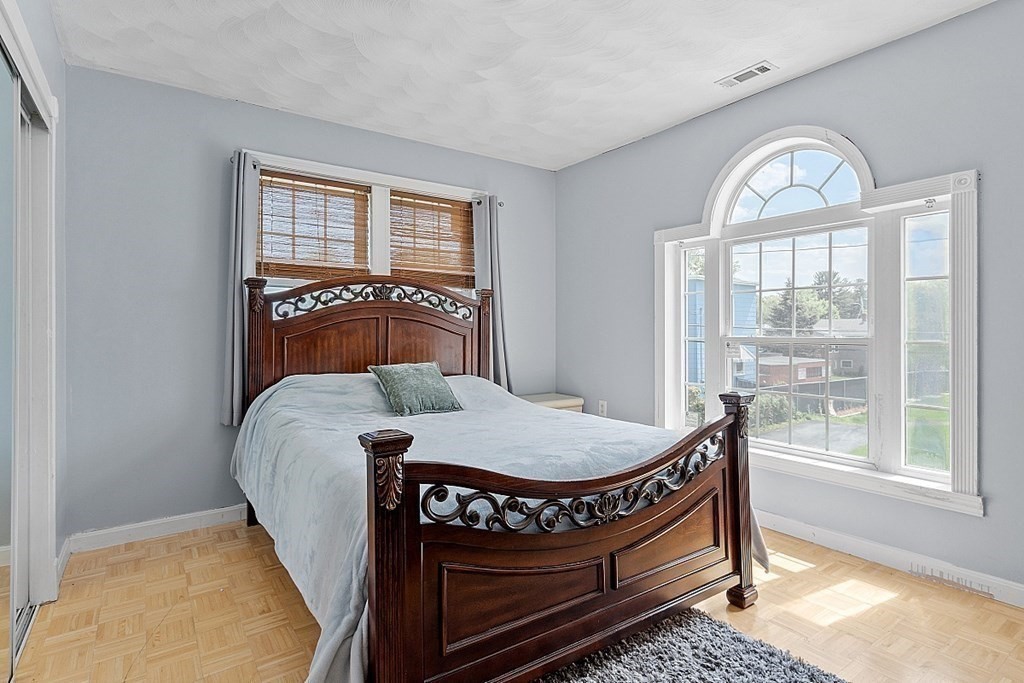 31 Booth Road Methuen, MA 01844 - Photo 25 of 38 a front view of a house with a wooden floor