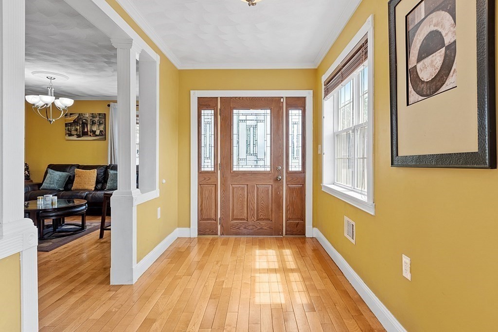 31 Booth Road Methuen, MA 01844 - Photo 3 of 38 a view of a bedroom with wooden floor and a window