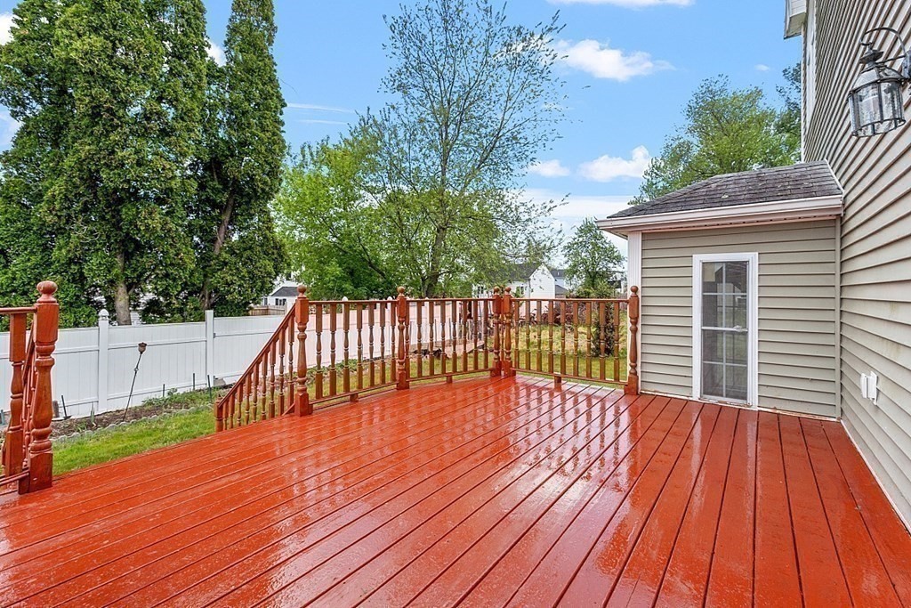 31 Booth Road Methuen, MA 01844 - Photo 32 of 38 a view of deck with wooden floor and fence