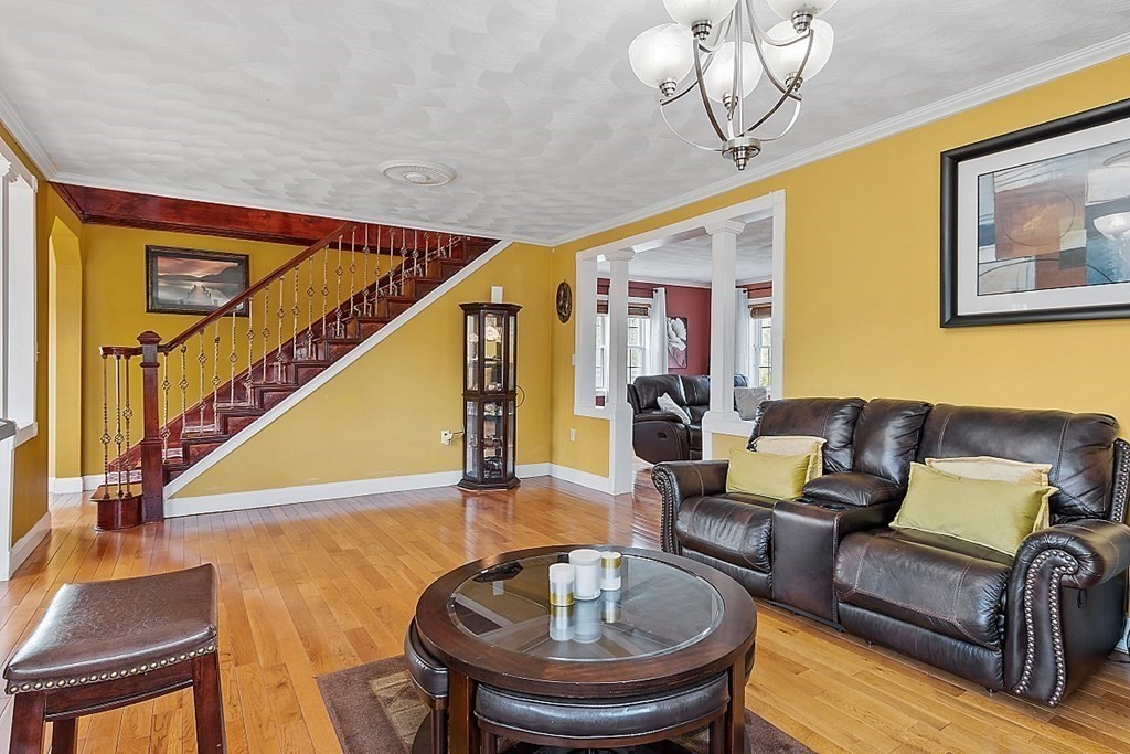 31 Booth Road Methuen, MA 01844 - Photo 6 of 38 a living room with furniture and a table