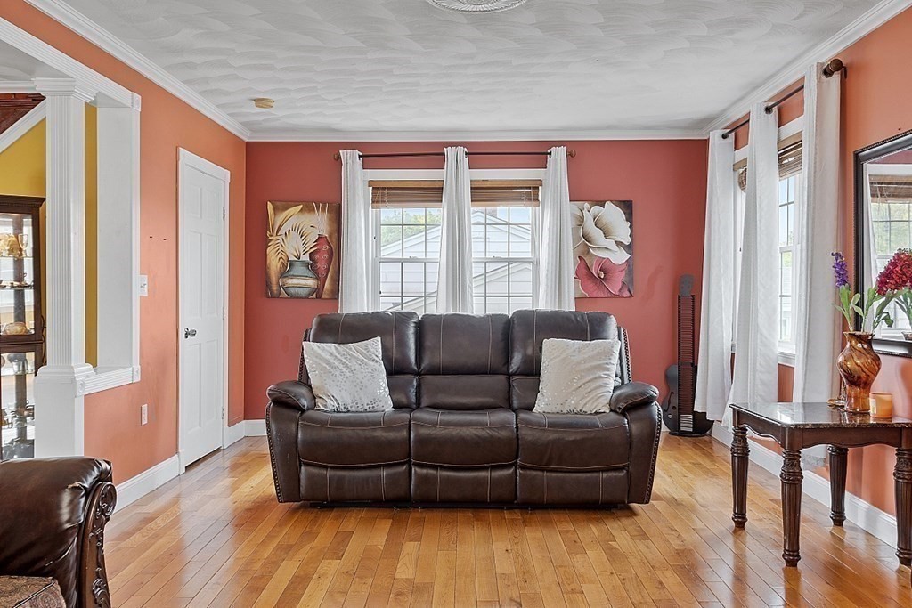 31 Booth Road Methuen, MA 01844 - Photo 9 of 38 a living room with furniture and a window