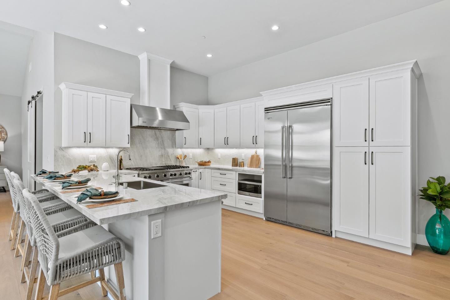 31 Indy Circle Soquel, CA 95073 - Photo 11 of 61 a kitchen with a refrigerator a stove a sink and a potted plant