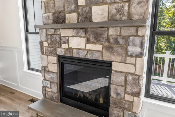 a view of a balcony with wooden floor